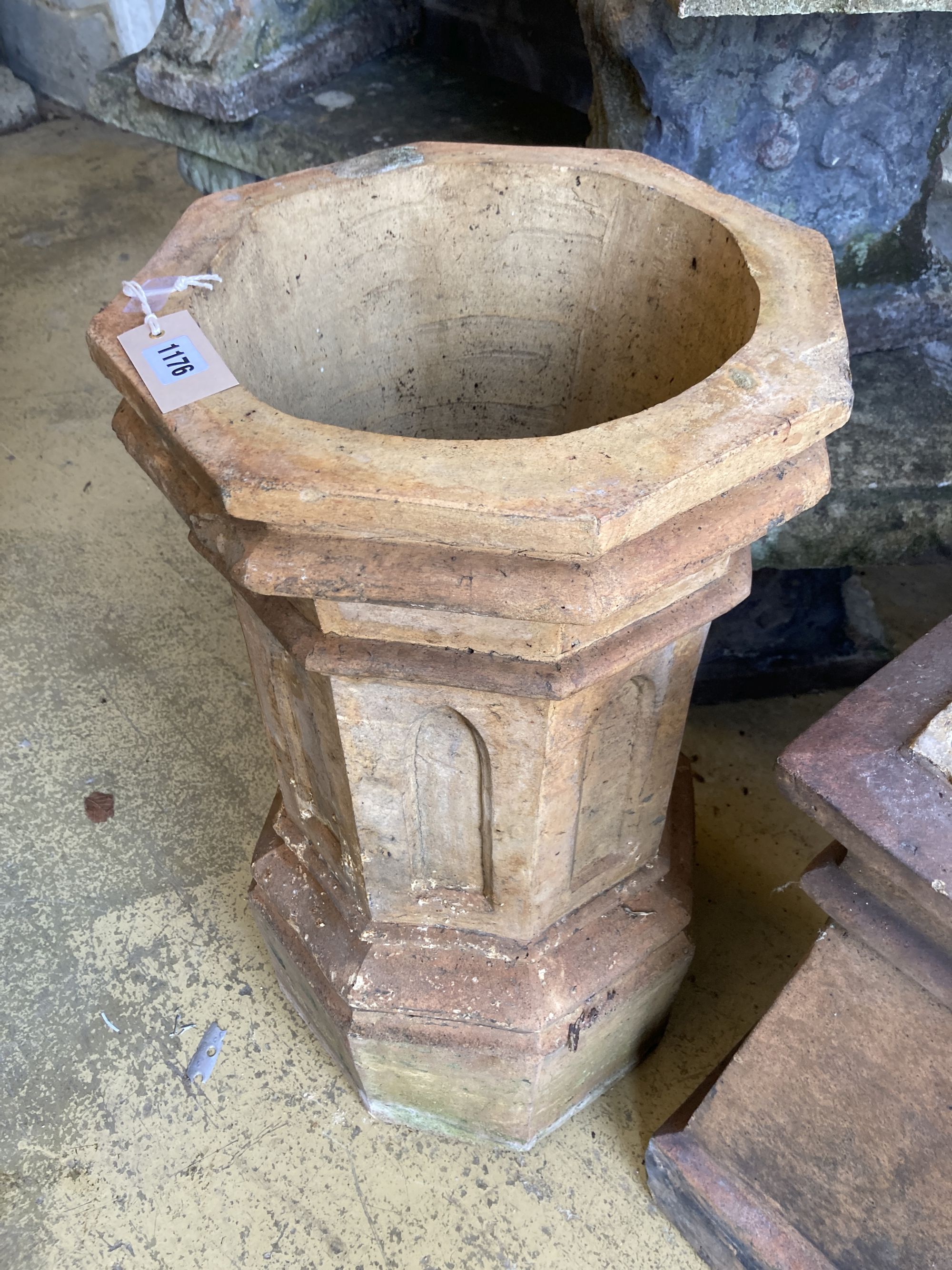 A terracotta chimney pot and another, larger 72cm high